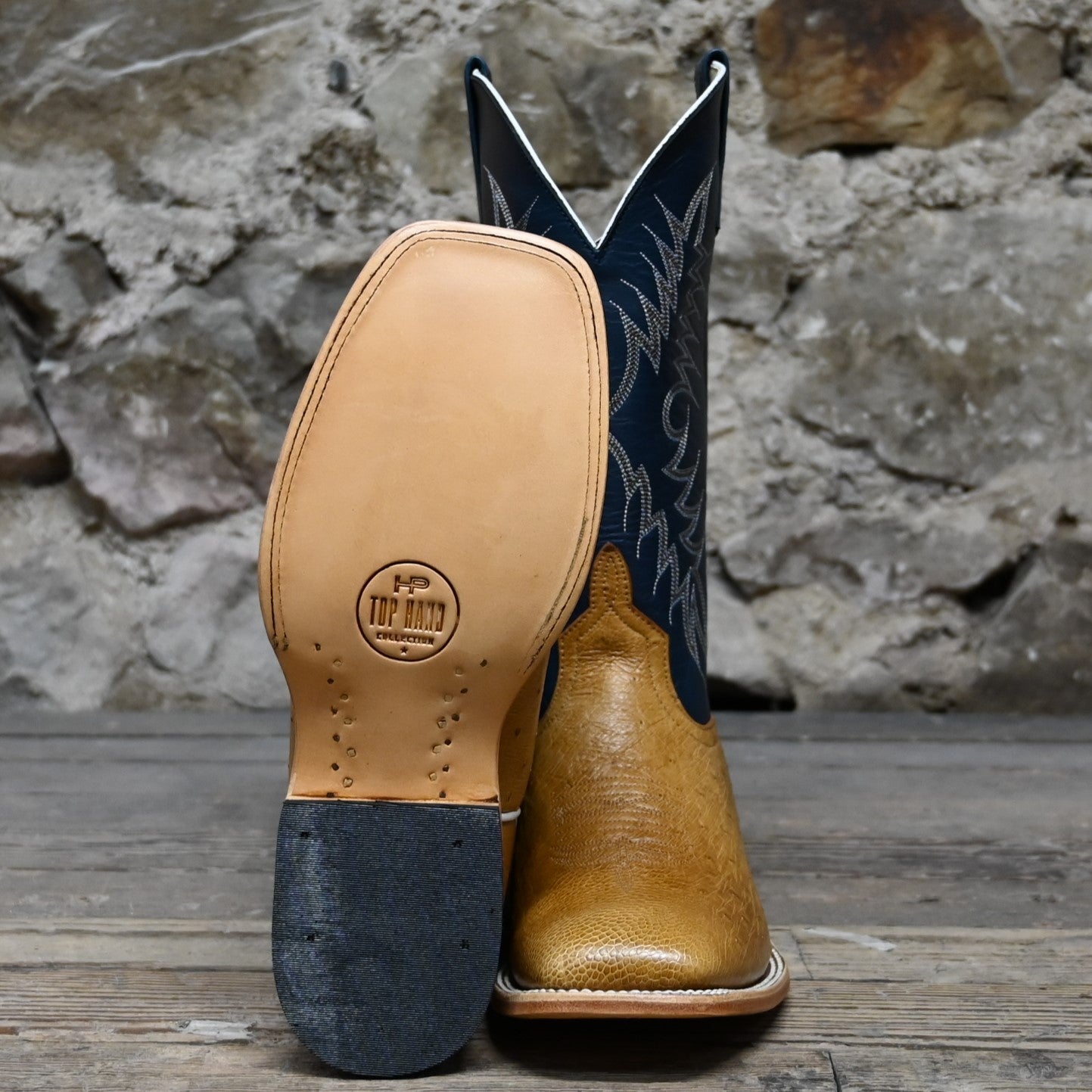 View of Horse Power 13" boot with blue glove top, antique saddle ostrich vamp, square toe, and pull straps