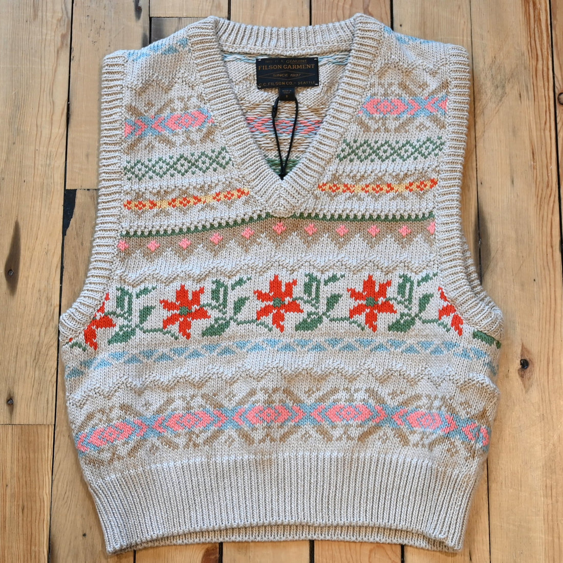 View of Filson Ladies 3GG Jacquard Fairisle Flower Vest featuring a floral jacquard-knit pattern and rib-knit collar
