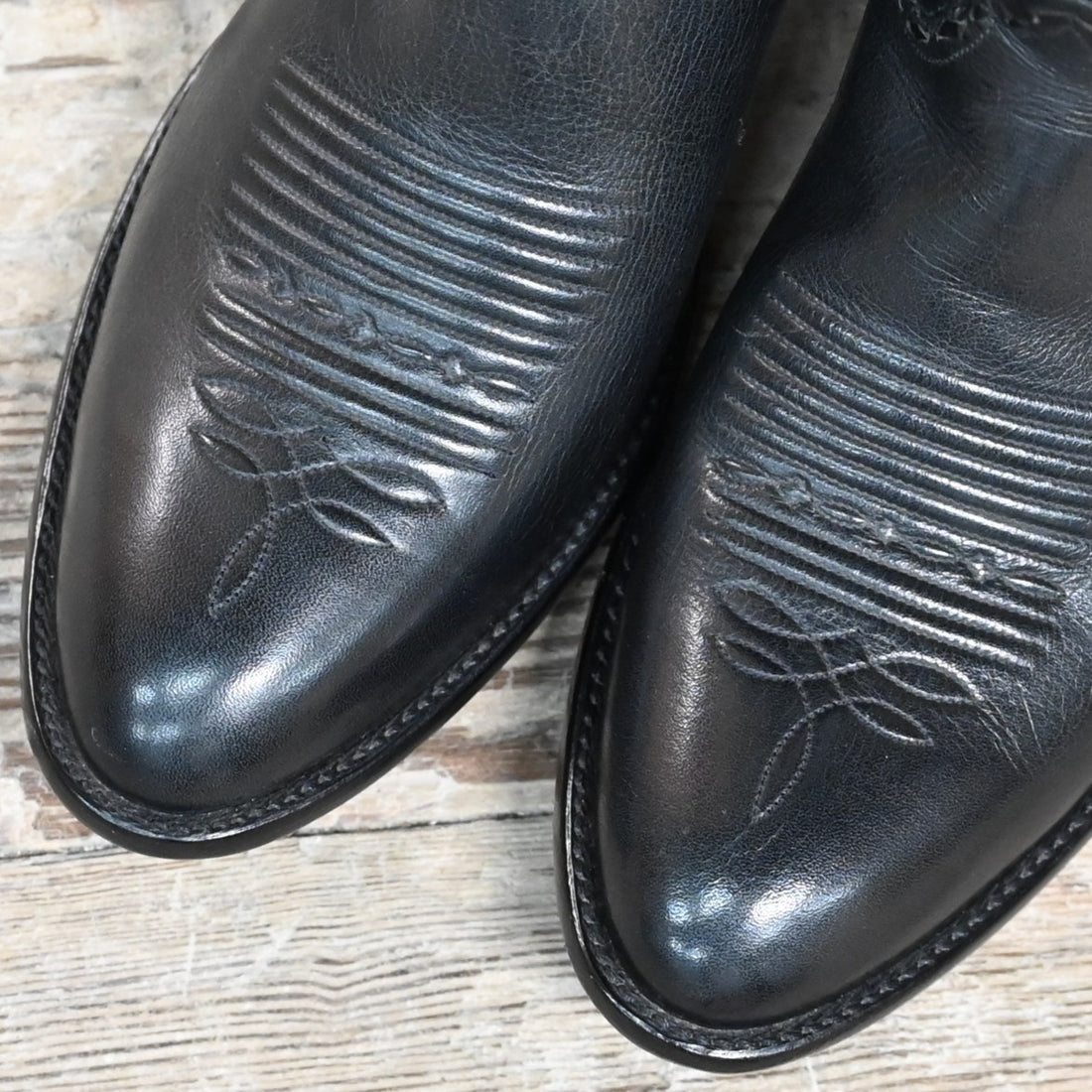 View of Stallion Men’s 13" Western boot with lacing, white buckstitching, and small round toe