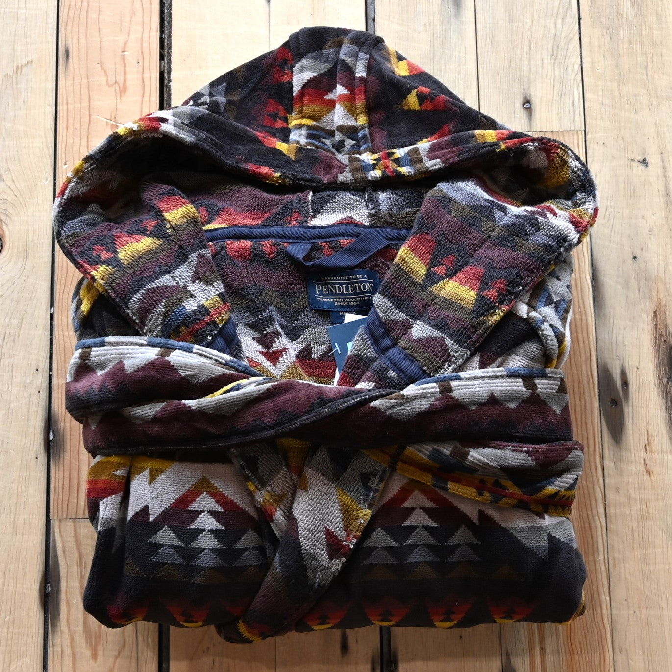 View of Pendleton unisex cotton terry velour robe in assorted patterns with hood and pockets