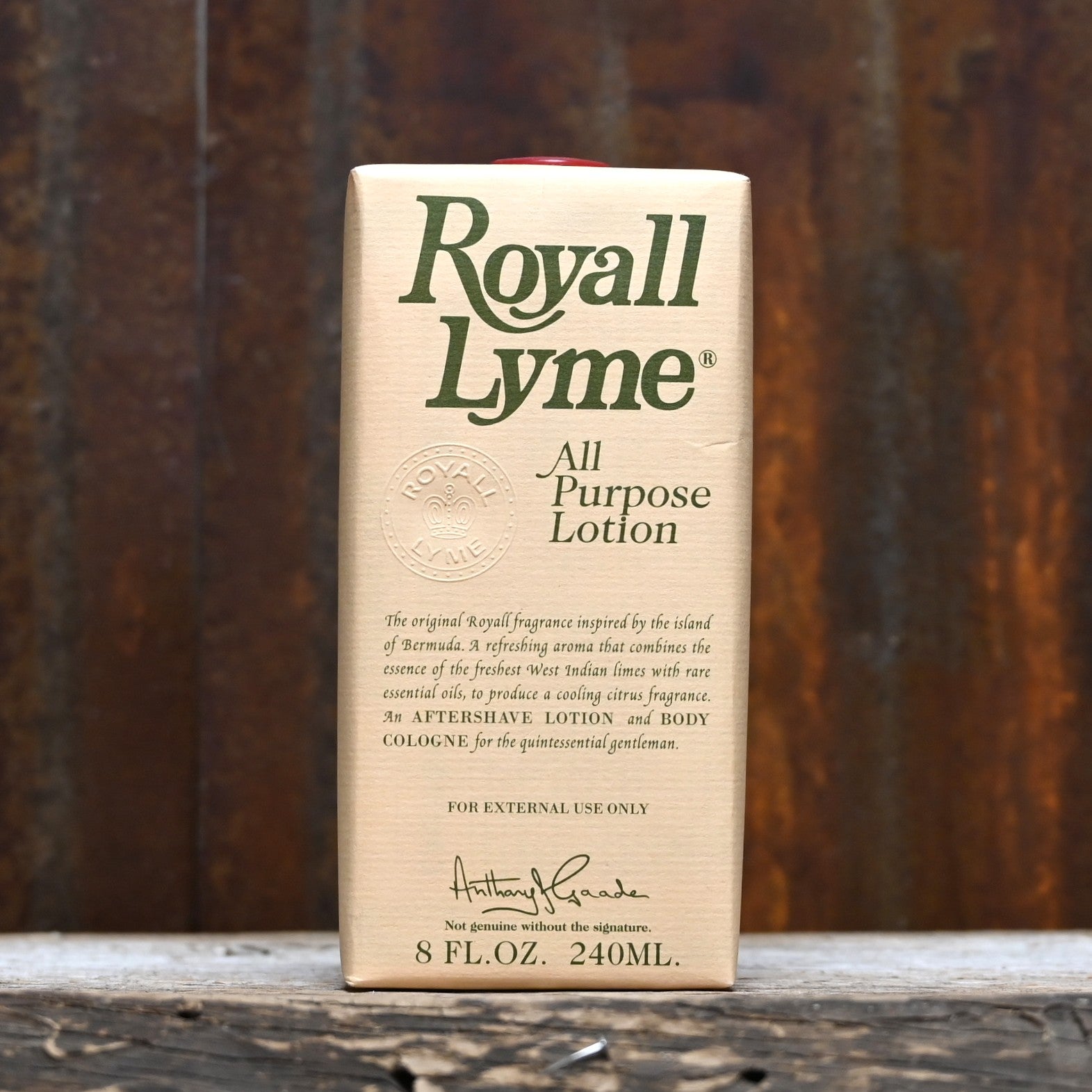 Royall Lyme 8 oz bottle of all-purpose lotion and splash cologne in classic green glass with gold cap