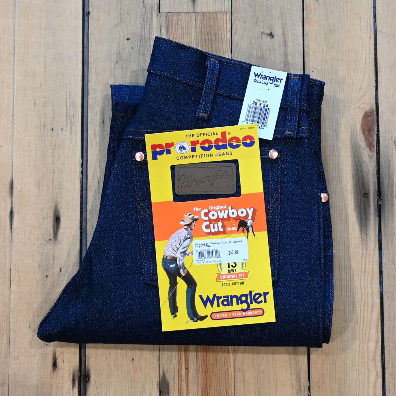 View of Wrangler Men’s Cowboy Cut Original Fit jeans in Prewashed Indigo with boot leg and five-pocket styling