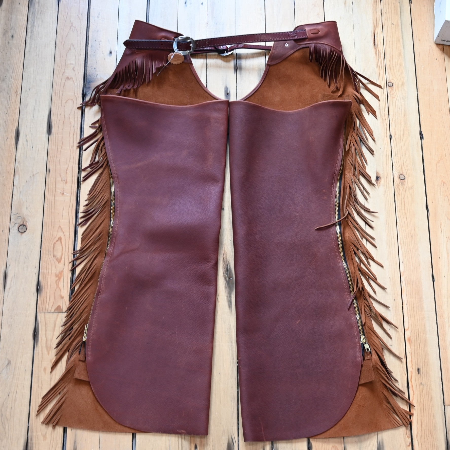View of K Bar J Cowboy Basic Shotgun Chaps in Size X-Large with fringe and buckle closures