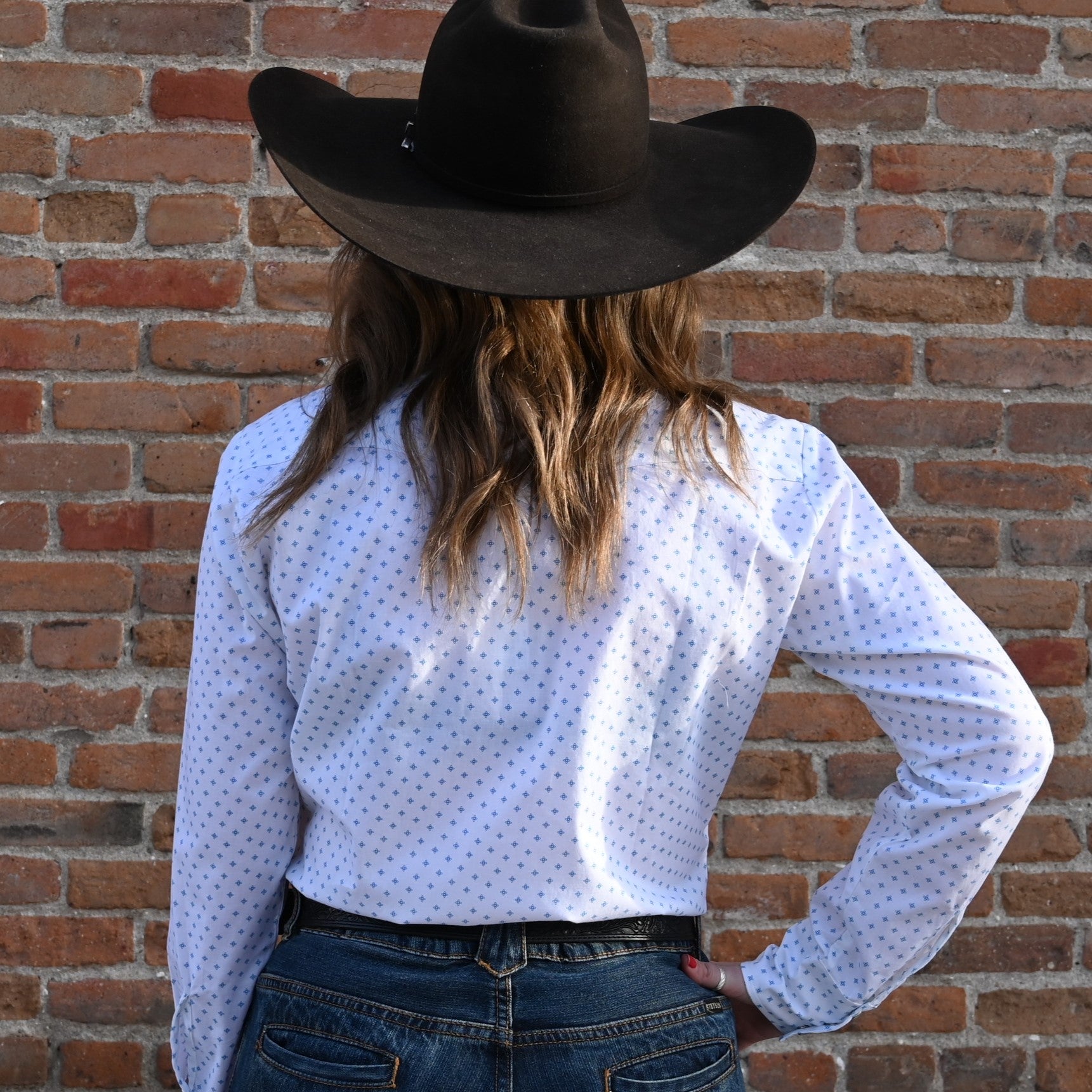 View of Blue Blanket ladies blue star western shirt with pearl snaps and bold motif