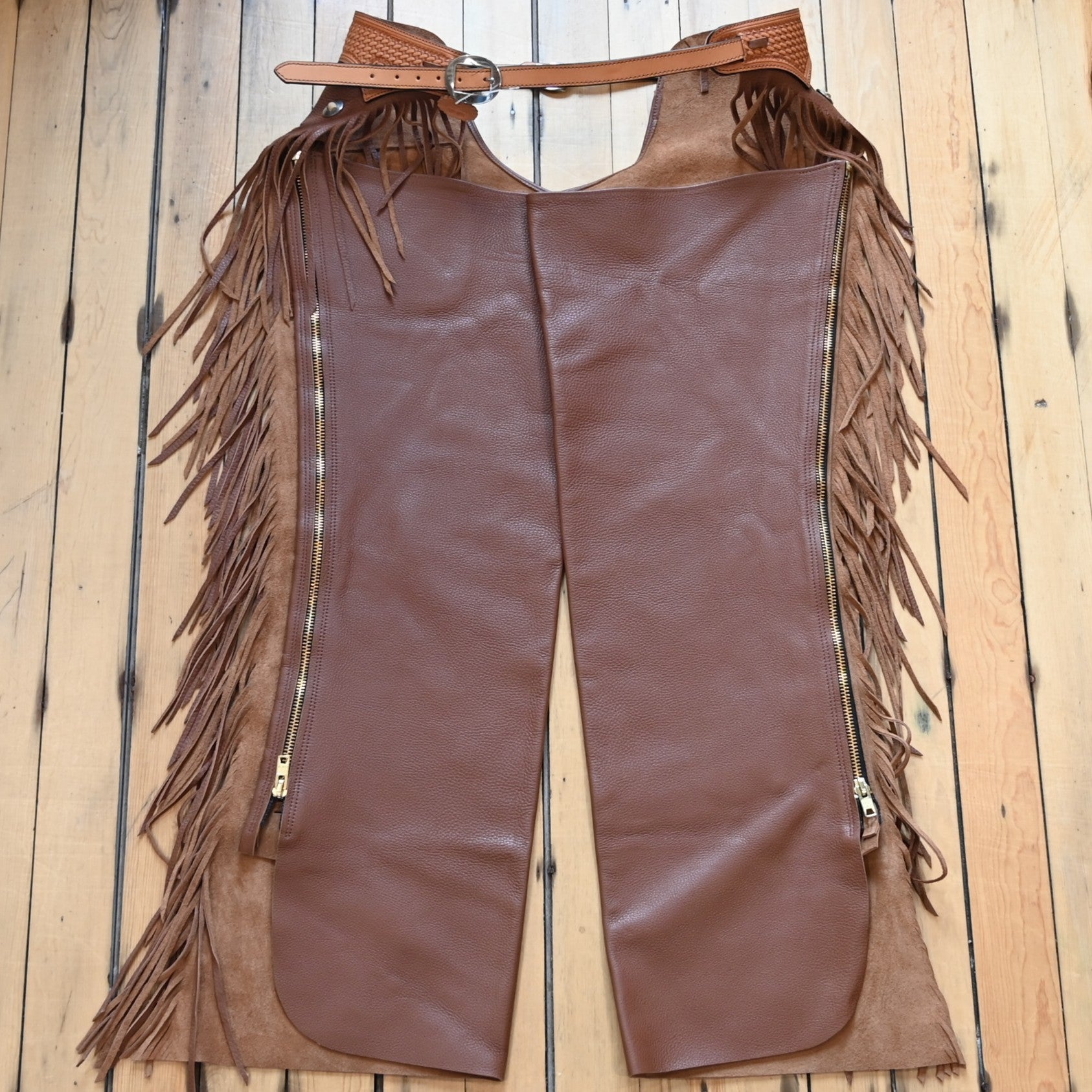 View of K Bar J Puncher Versatility Chap in Size XL with fringe and conchos