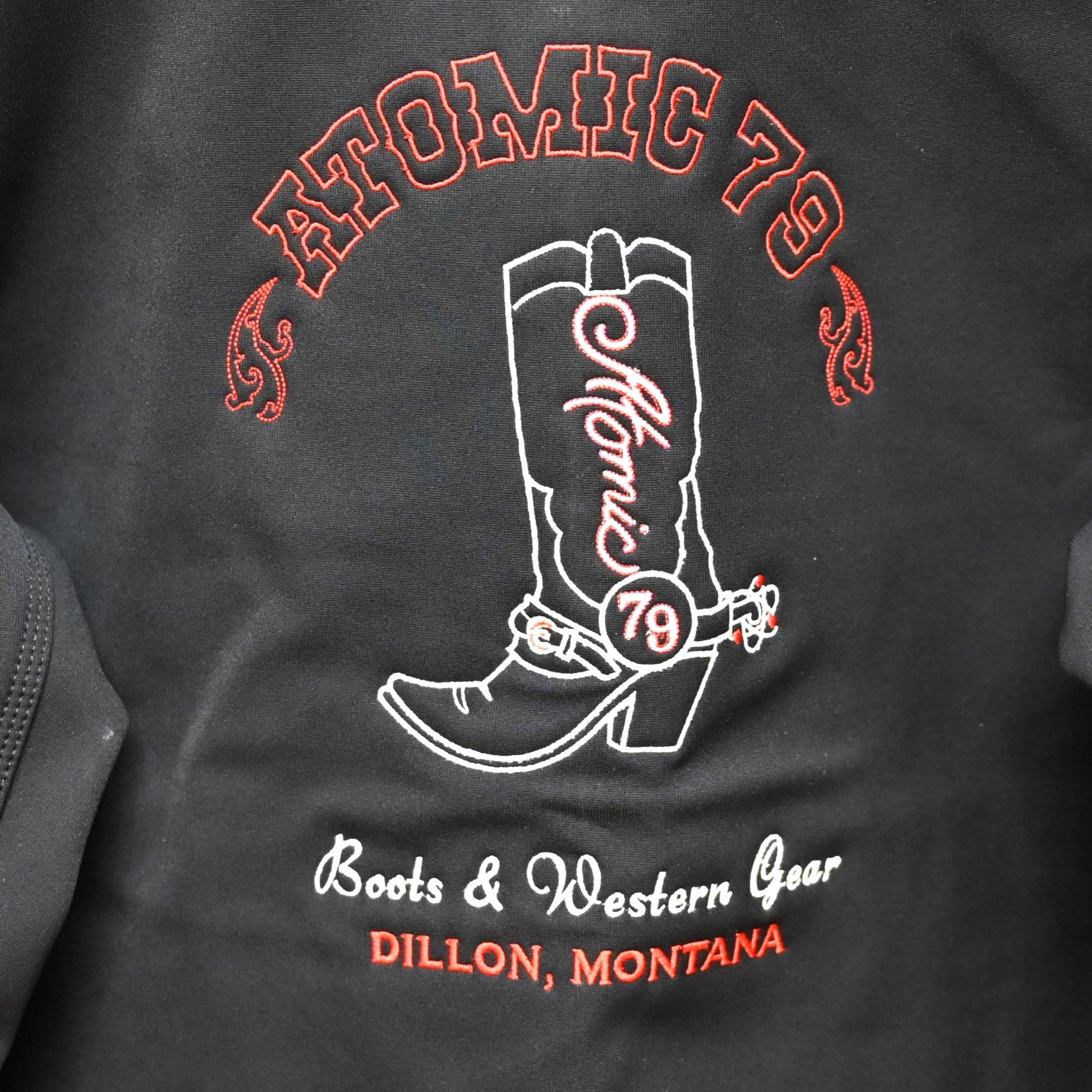 Carhartt Black Crowley Soft Shell w/ Atomic 79 Embroidery on back view of logo