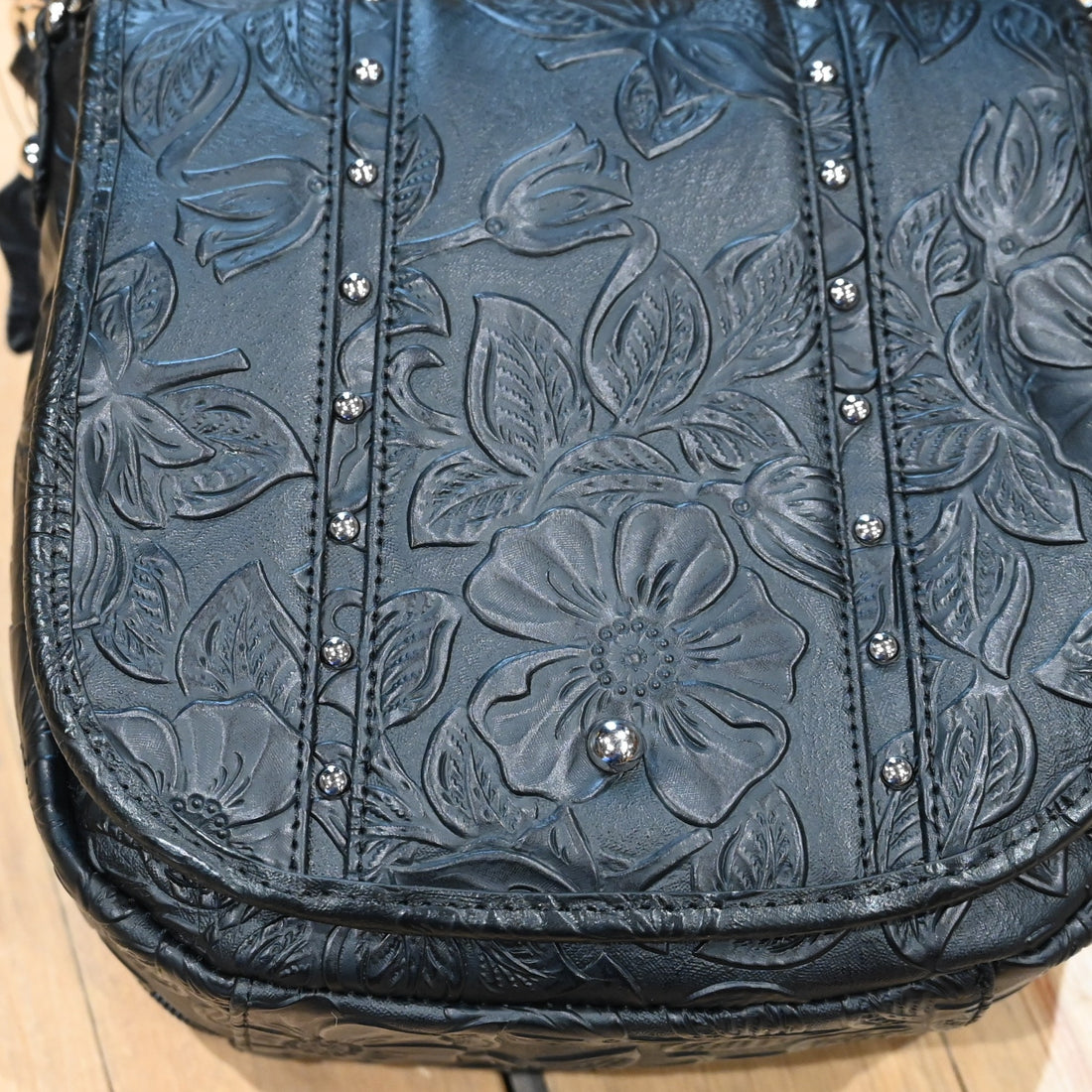 Gun Toten Mamas black studded flap conceal carry bag with embossed rose-leaf tooling