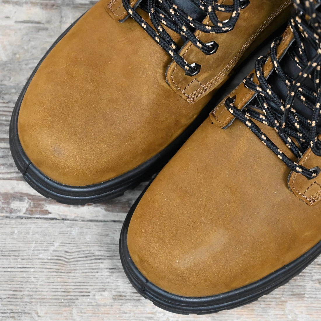 Blundstone 6-inch lace-up work boot in black leather with steel toe and safety outsole