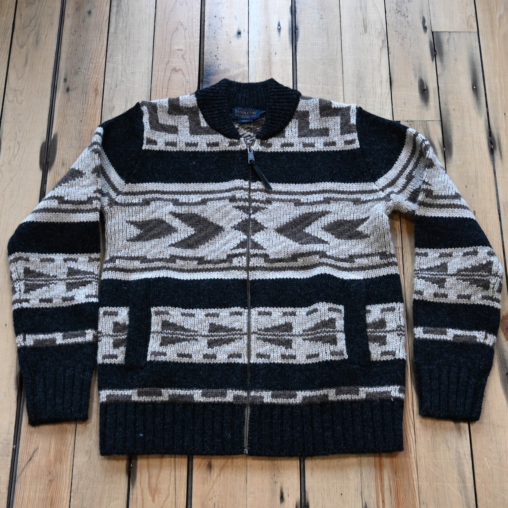 View of Pendleton Shetland zip sweater in Oxford Grey Multi with jacquard pattern and side pockets