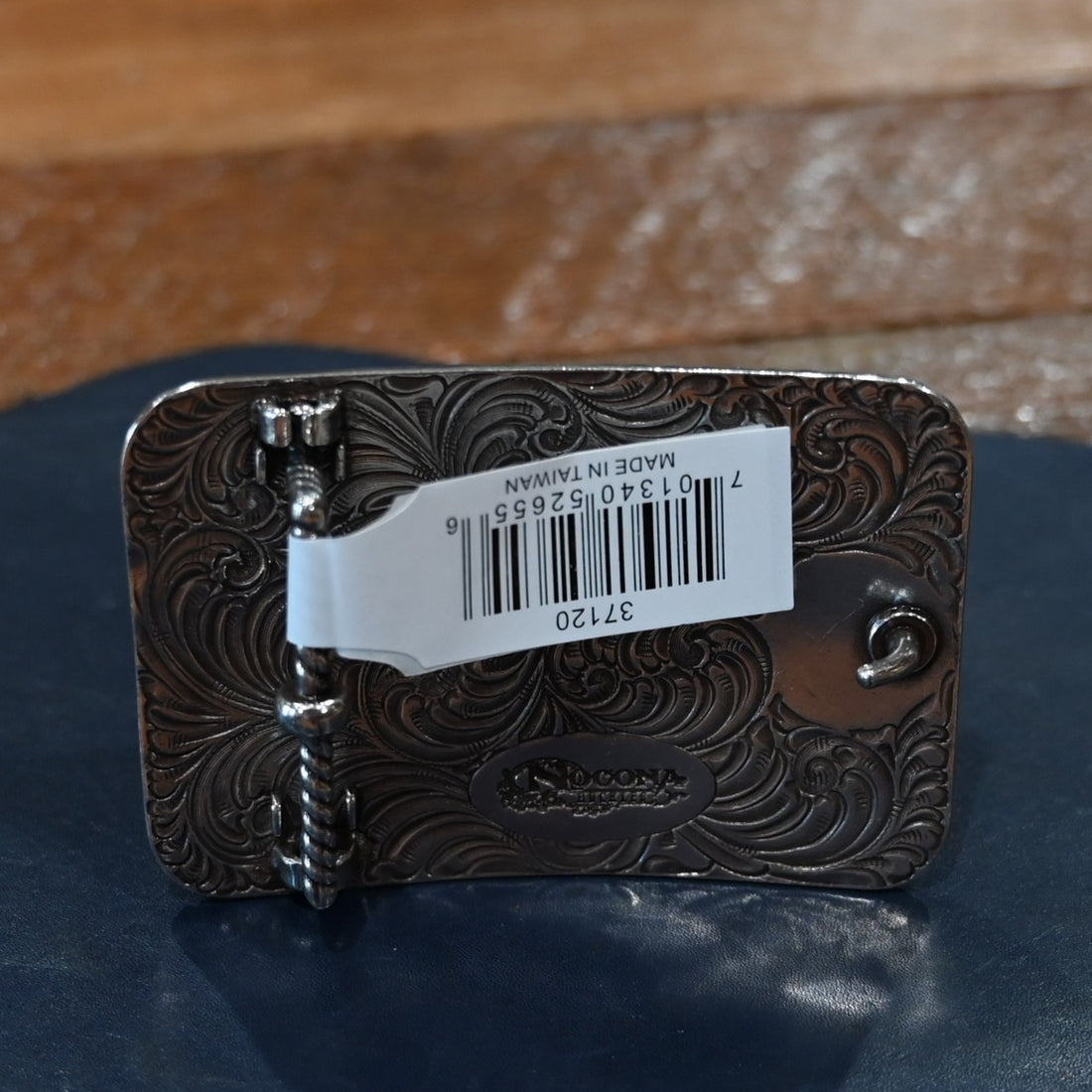 Nocona rectangle buckle with rope border and engraved floral and scroll design