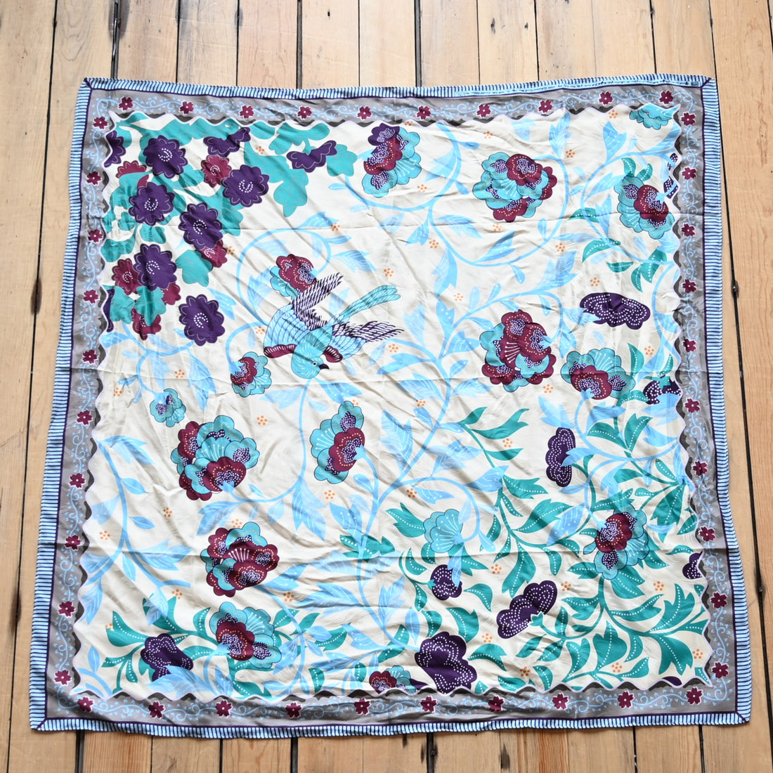 View of Rockmount silk scarf with Buffalo Bill floral and swallow design – 36" square