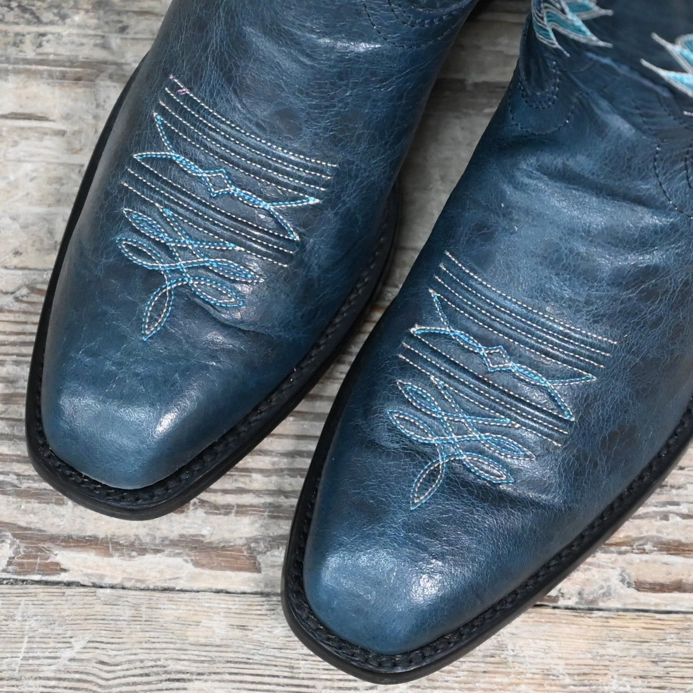 View of Hondo 13" cowboy boot in blue cowhide with tight French square toe and spur ledge
