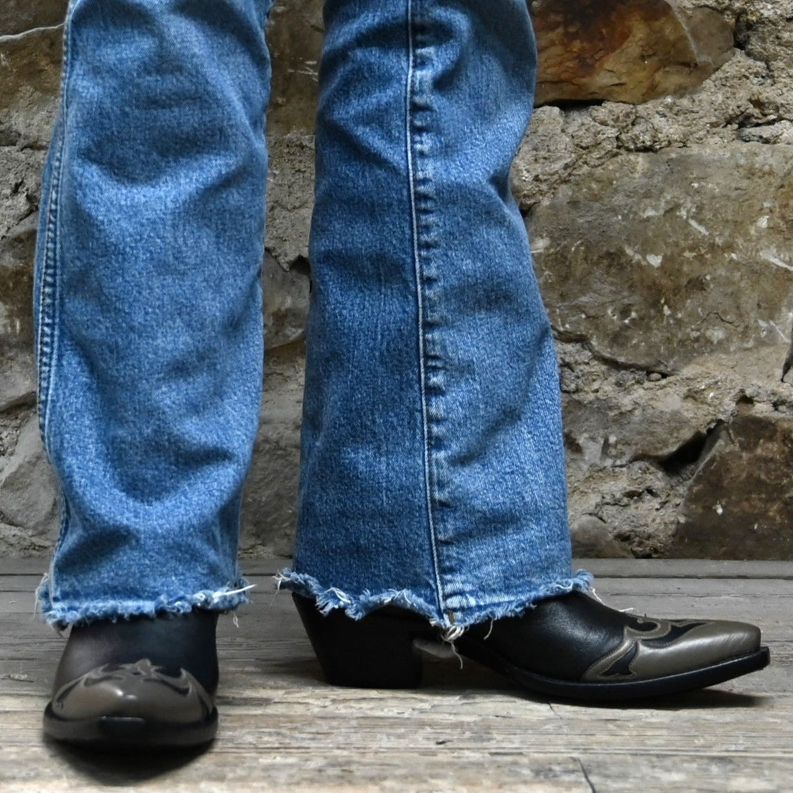 View of Stallion Ladies 11" midnight hair-on boot with gray wingtip, foxing, and multicolor inlays