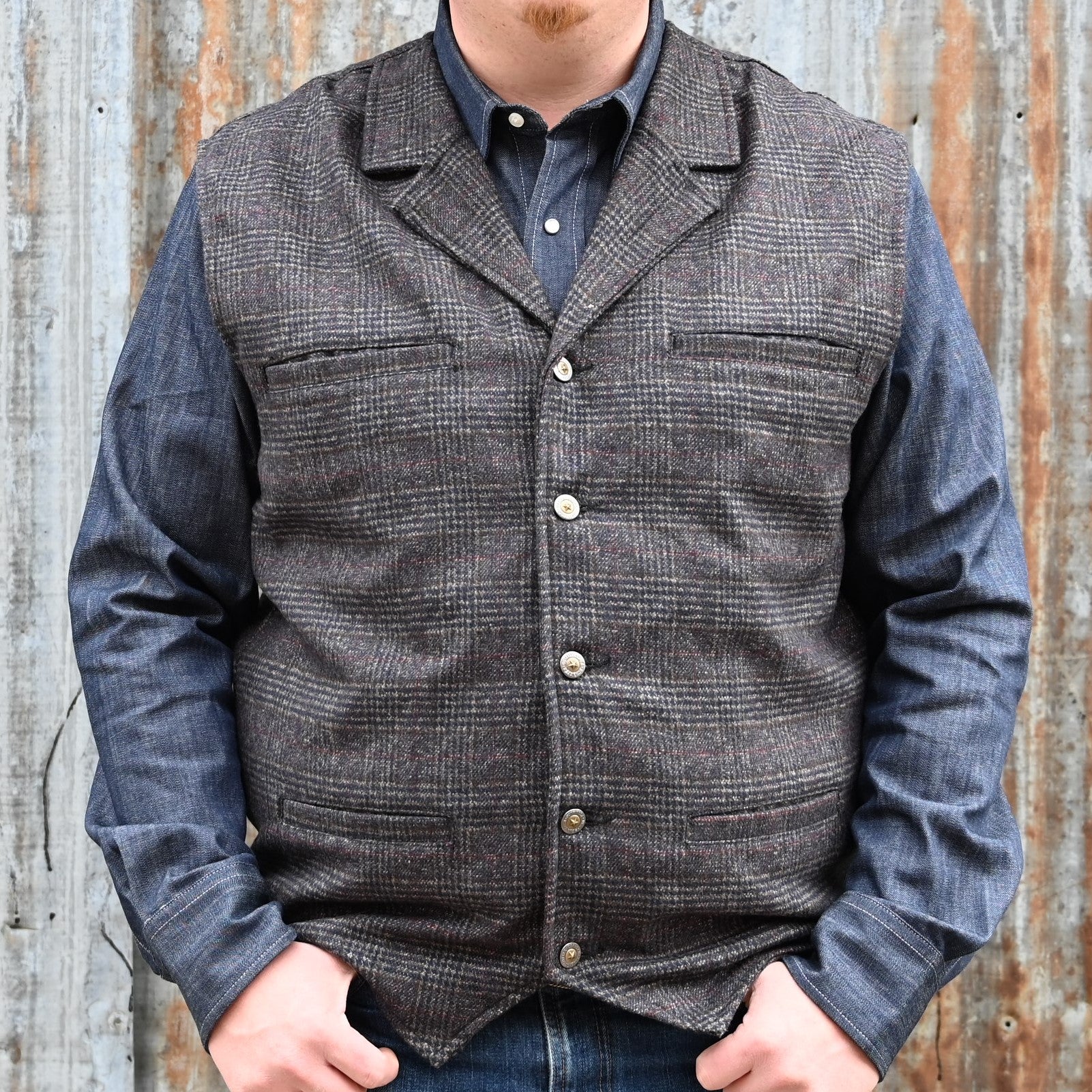 View of Schaefer Laramie vest in assorted wool-blend patterns with Western lapels and four-pocket design