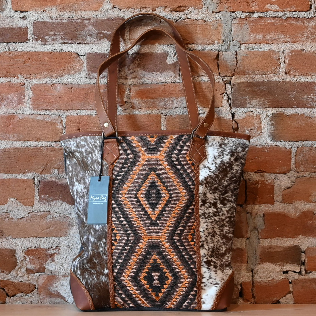 Myra Stone Valley tote bag with leather, hairon, and woven rug design