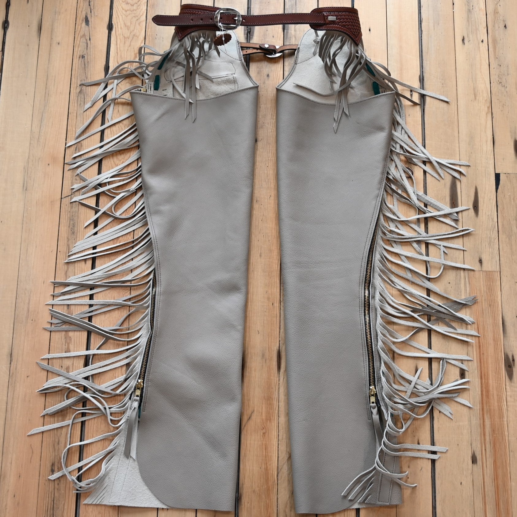 View of K Bar J Borderline Versatility Chap in Medium with fringe and leather border