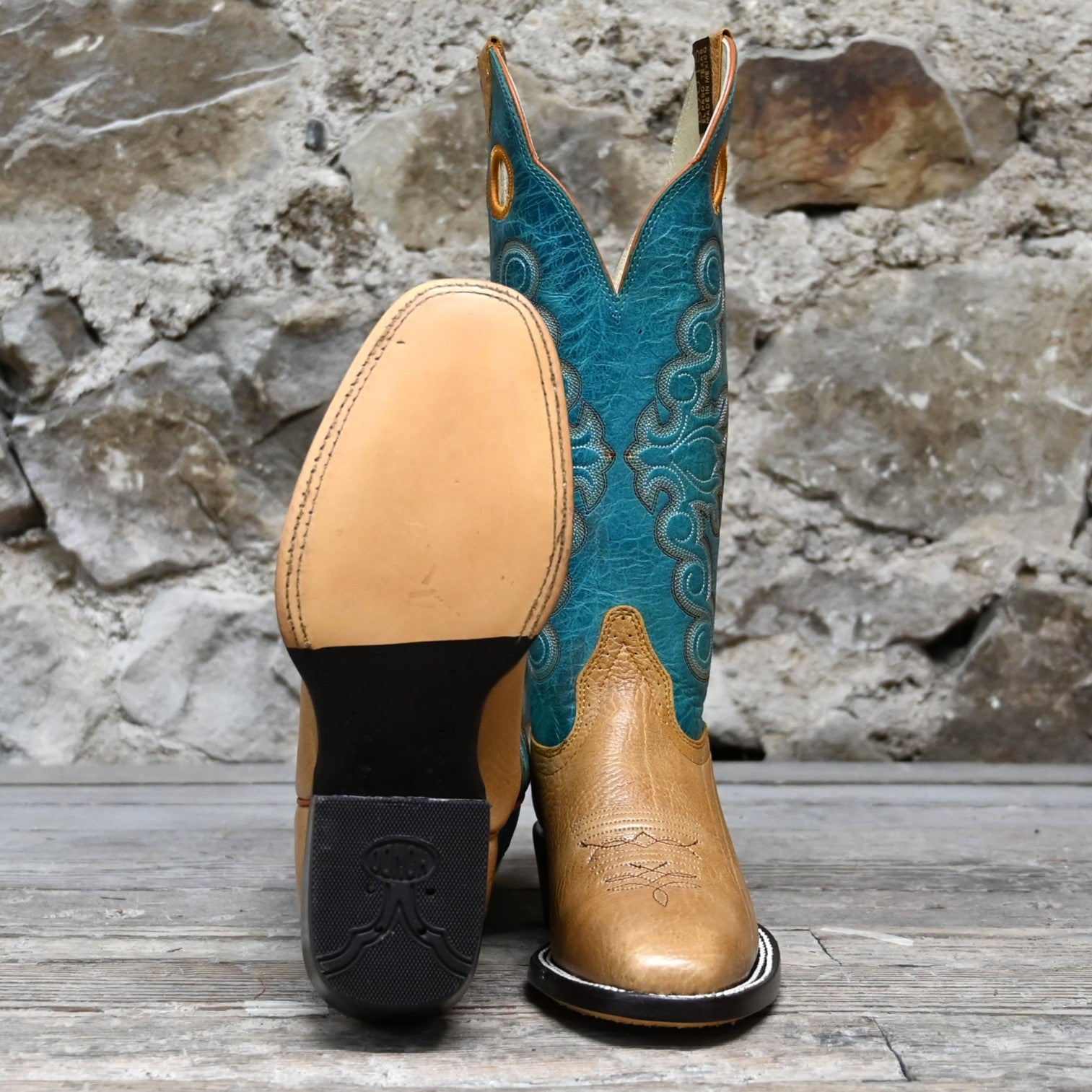 View of Hondo 14" cowboy boot with turquoise volcano top, honey shoulder vamp, and tight square toe