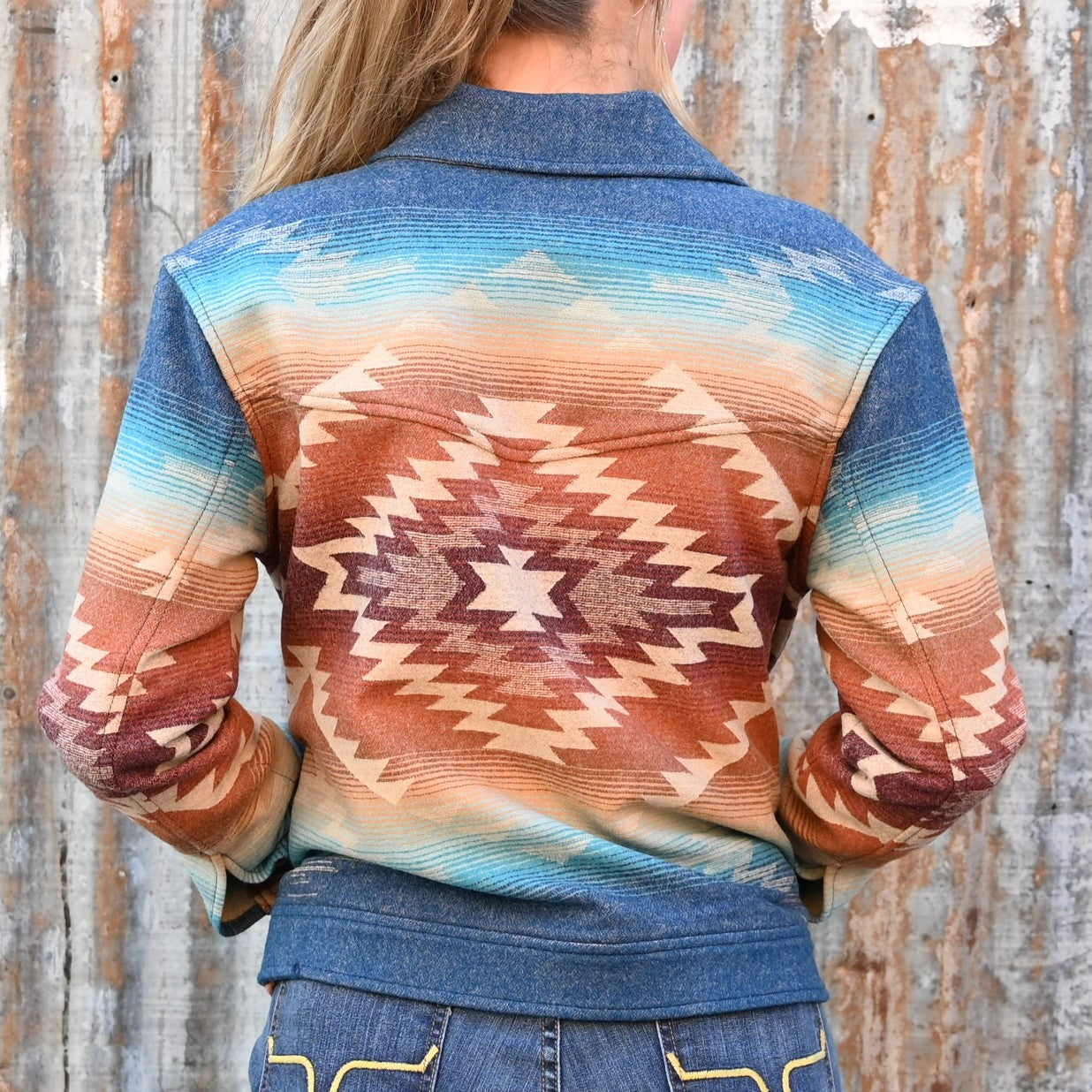 View of Turquoise Pagosa Springs patterned wool jacket by Pendleton with snap-front and side-entry pockets