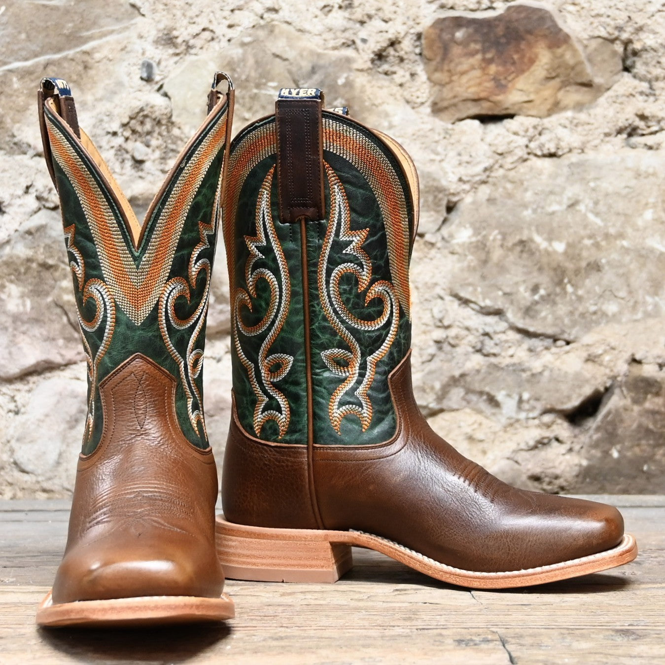 View of Hyer EASTON 11" boots showcasing brown cowhide leather vamp and green vintage cowhide top with broad square toe and Stockman block heel