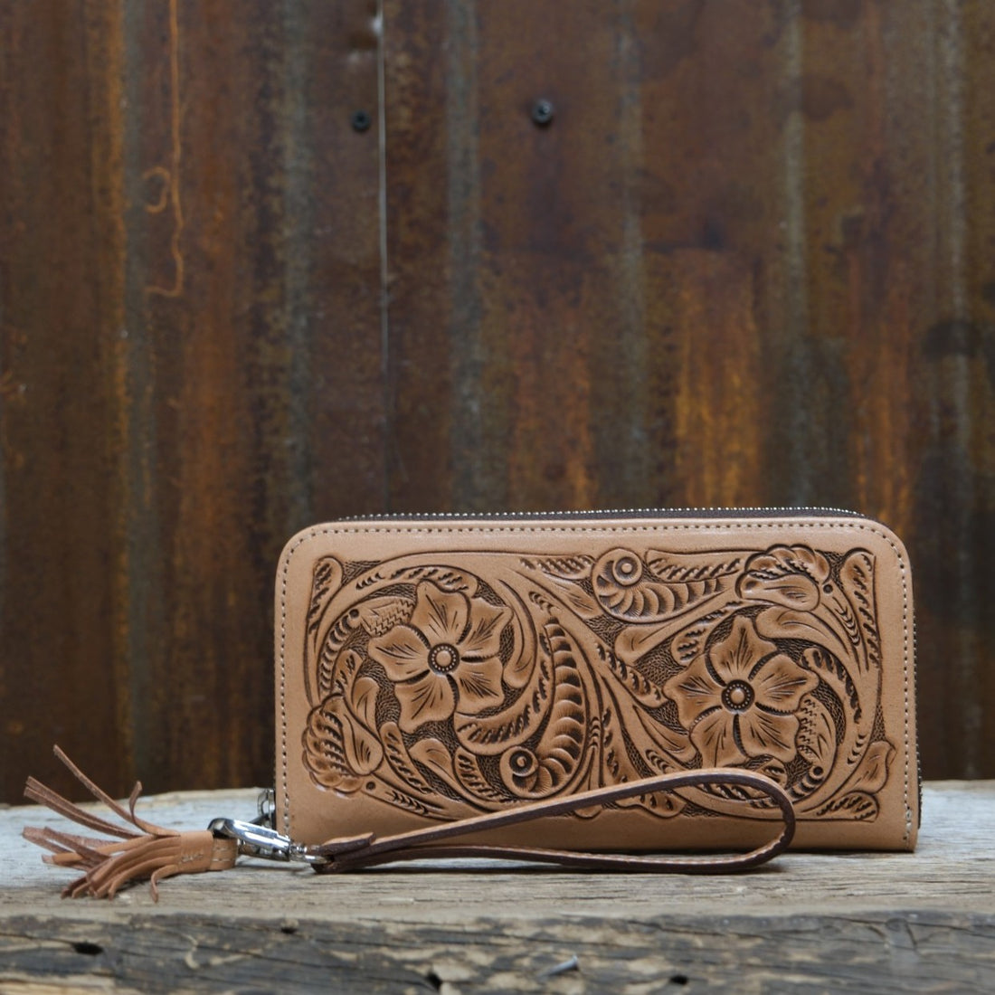 Que Chula natural tooled leather zip wallet with floral Western tooling and wrist strap
