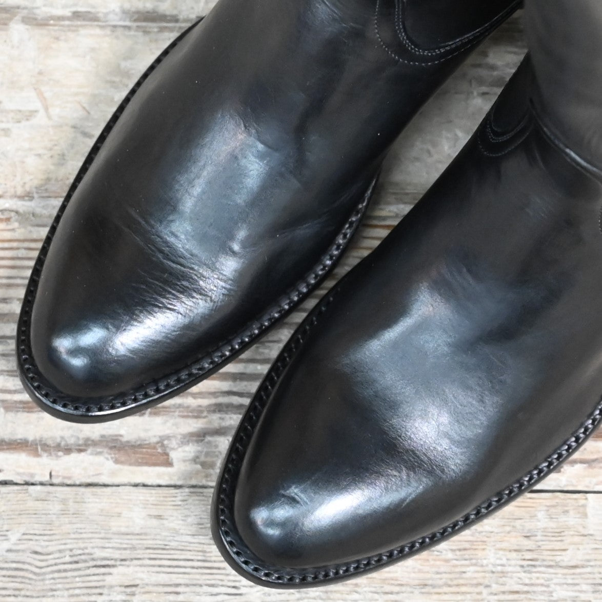 View of Stallion Ladies 16" Black European Calf English High Boot with B toe and covered piping