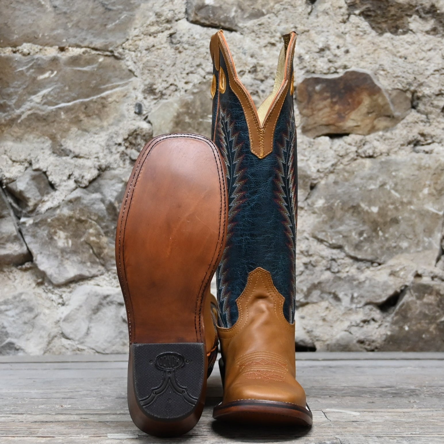 View of Hondo 16" cowboy boot with navy volcano top, honey crazy horse vamp, wide square toe, and pull holes