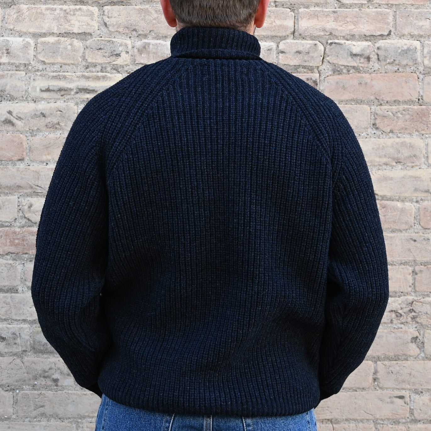 View of Filson Bristol Roll Neck Sweater in Dark Navy Heather featuring vertical fisherman&