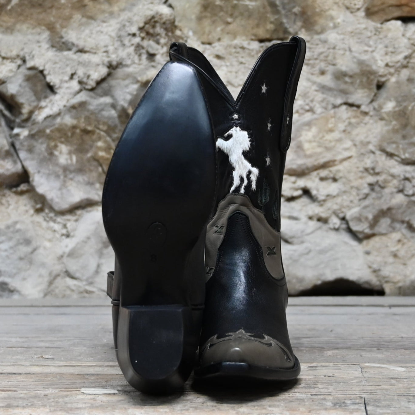 View of Stallion Ladies 11" midnight hair-on boot with gray wingtip, foxing, and multicolor inlays
