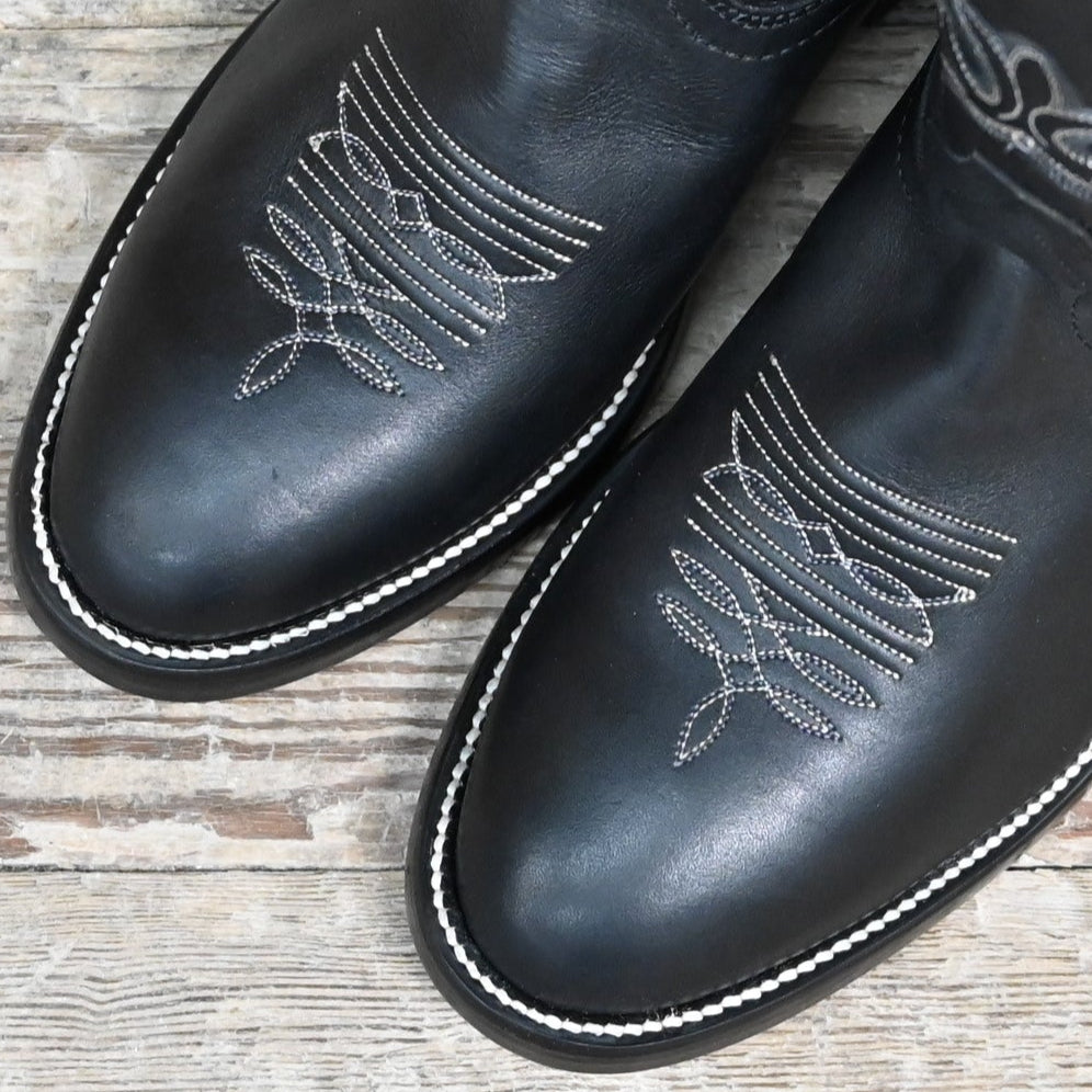 View of Hondo 16" cowboy boot in black retan with flourished stitching, pull holes, and spur ledge