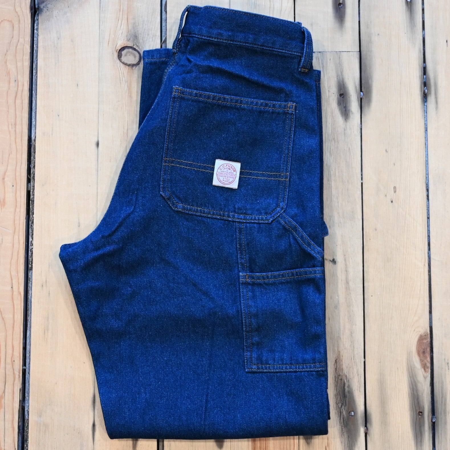 Filson ladies dark rinse 9-oz work jeans with reinforced fronts and tool pockets