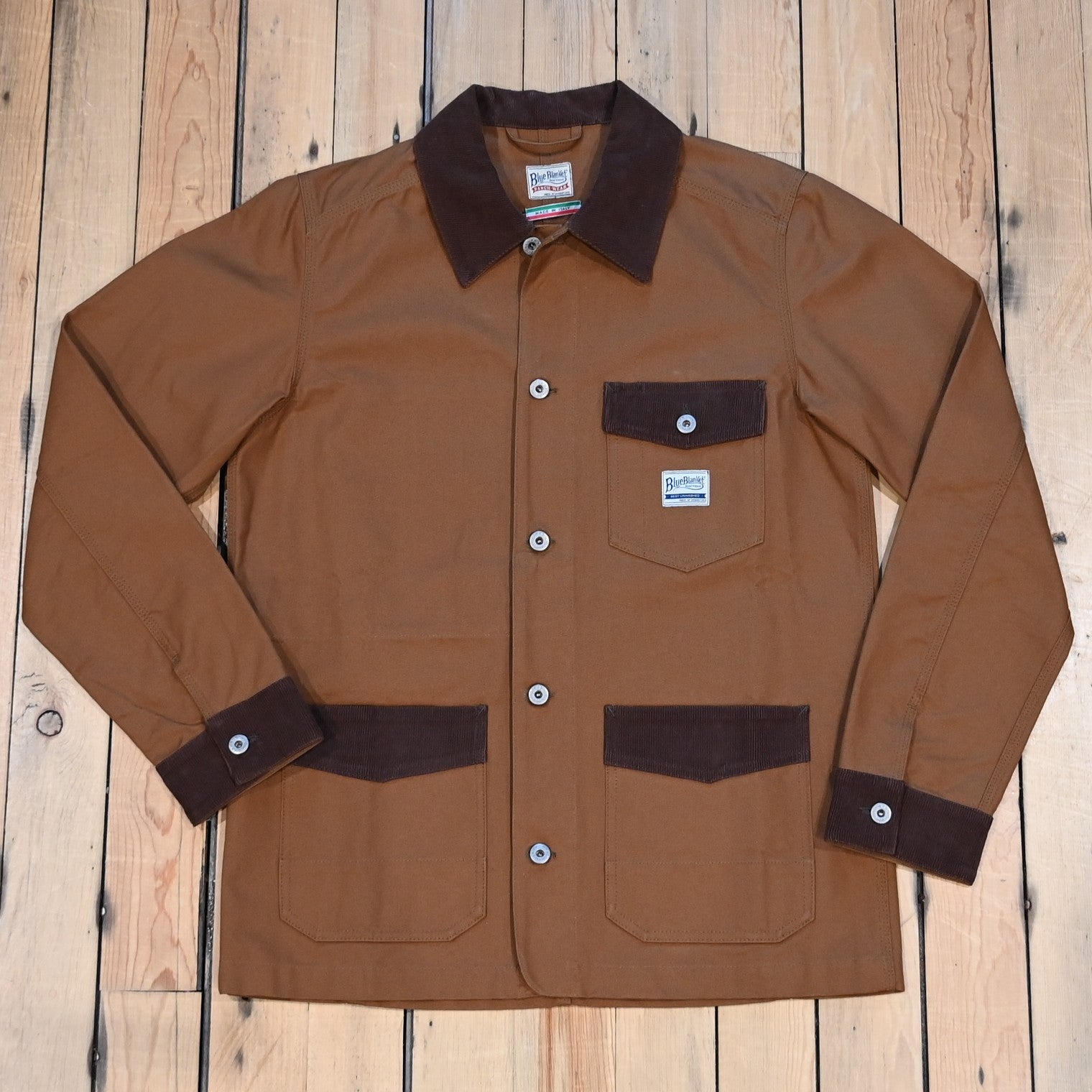 Blue Blanket Miner Jacket in Italian duck canvas with flap pockets and brown corduroy details