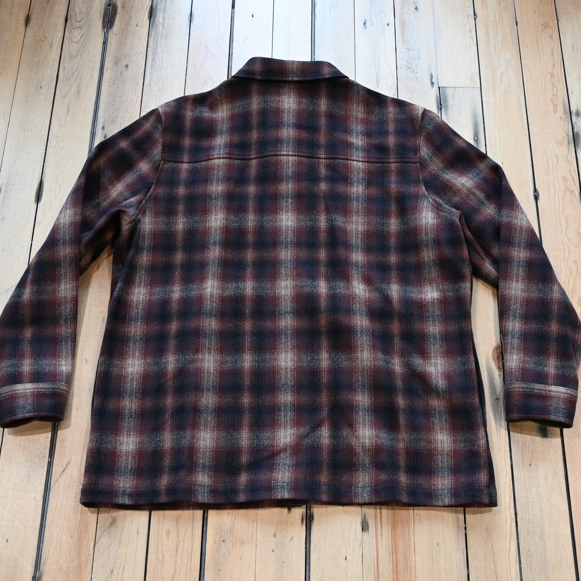 View of Pendleton men’s Heston wool coat in brown and rust ombré with chest and side pockets