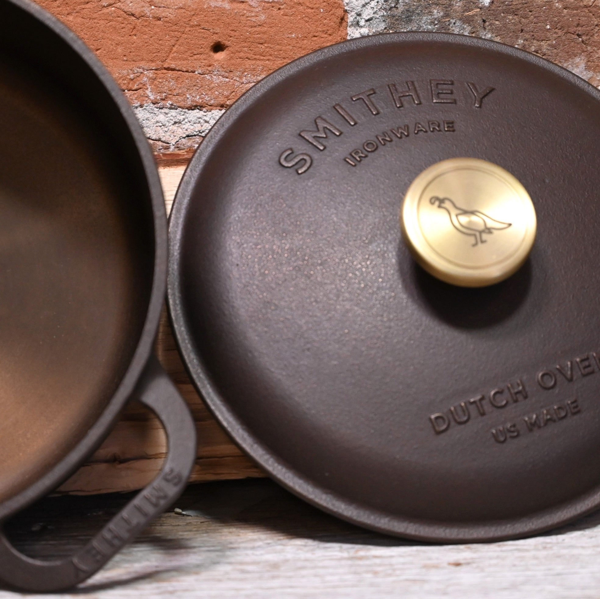 View of Smithey Ironware 5.5 qt Dutch Oven with polished interior and ergonomic handles