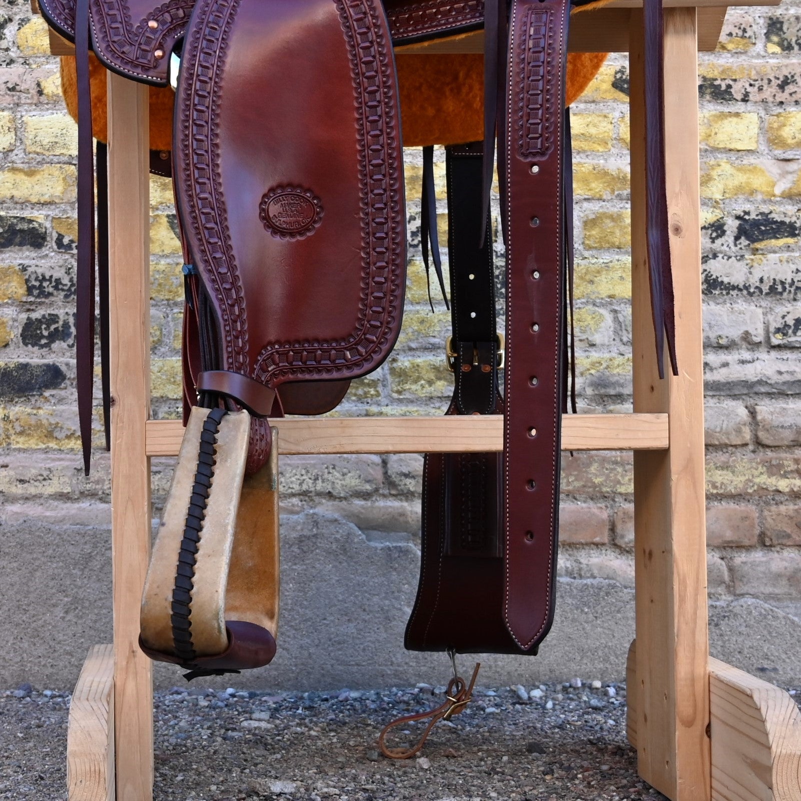 View of Billy Cook 15½" Arbuckle Wade Saddle with waffle border tooling and 7/8 in-skirt rigging