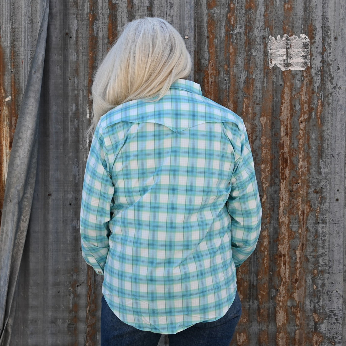 View of Schaefer blue & green plaid Range Tek shirt with snap front and mesh back vent
