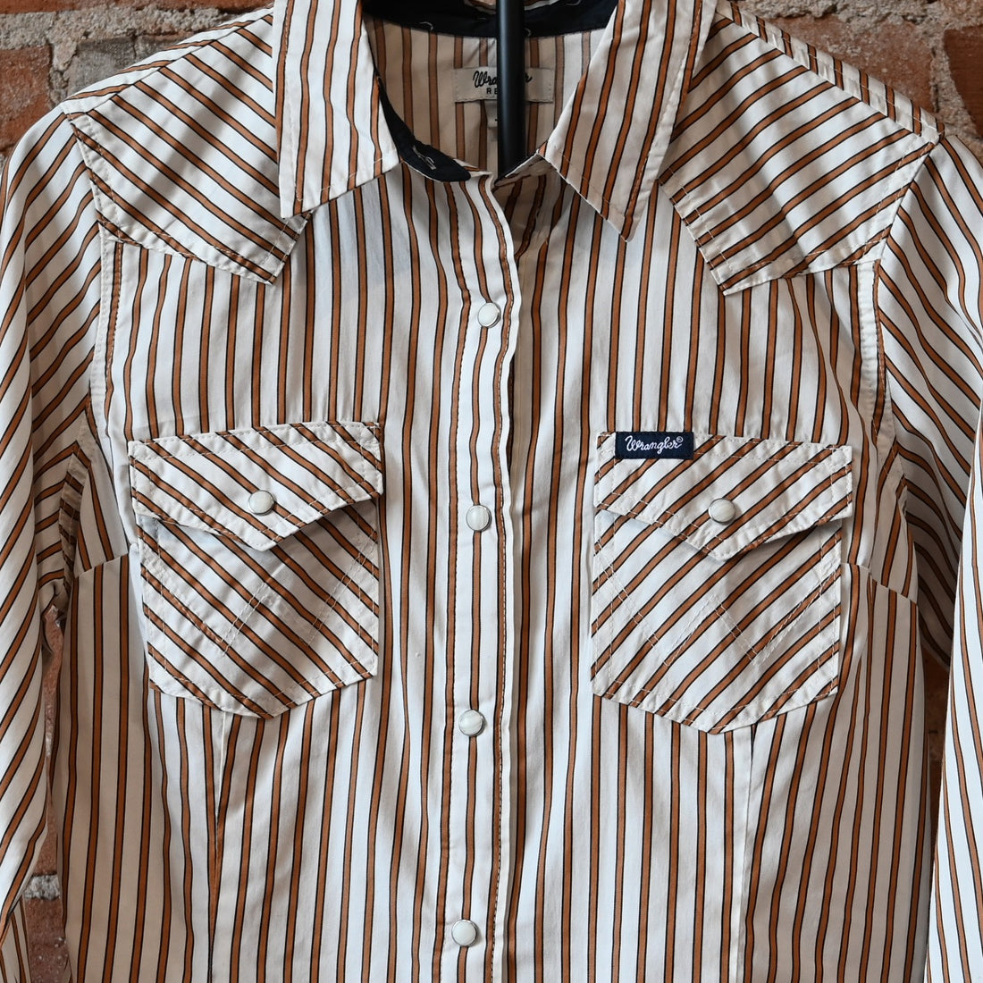 Wrangler Ladies All Occasion Western Snap Shirt in rust stripes with pearl snaps and chest pockets