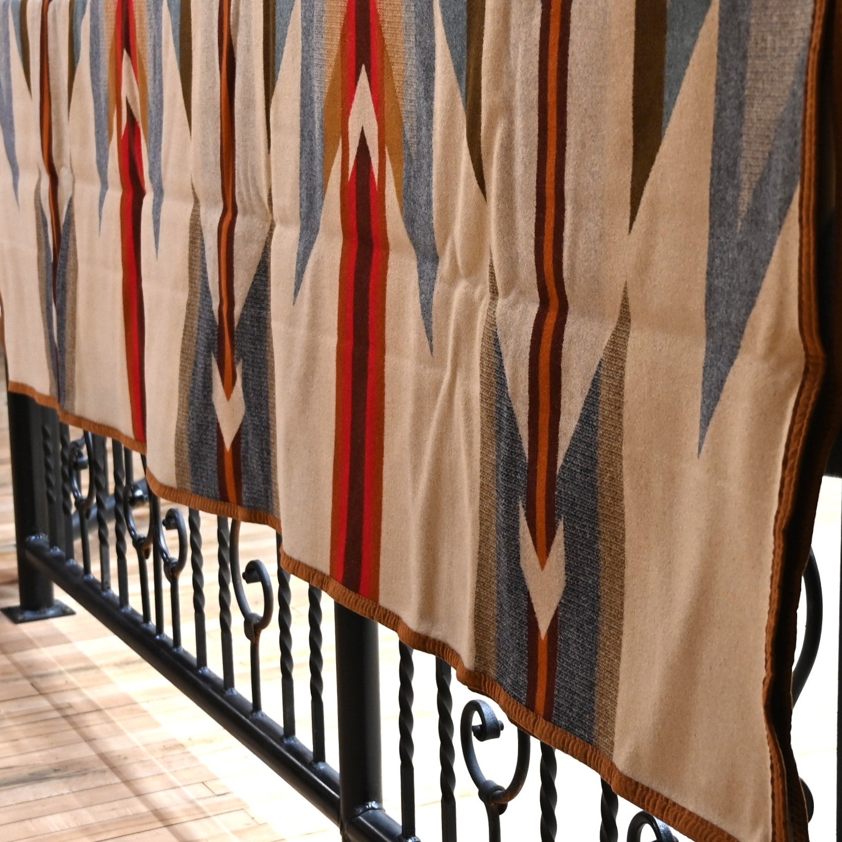 View of Pendleton Wyeth Trail Queen blanket with bold geometric jacquard pattern