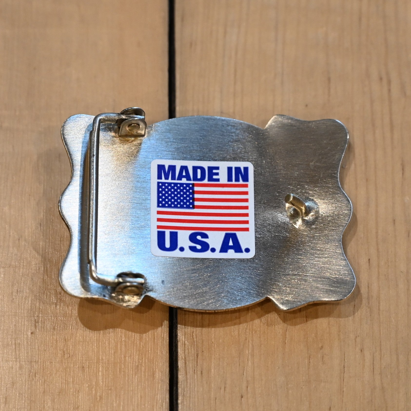 Rockmount belt buckle with “End of the Trail” relief design of rider and horse