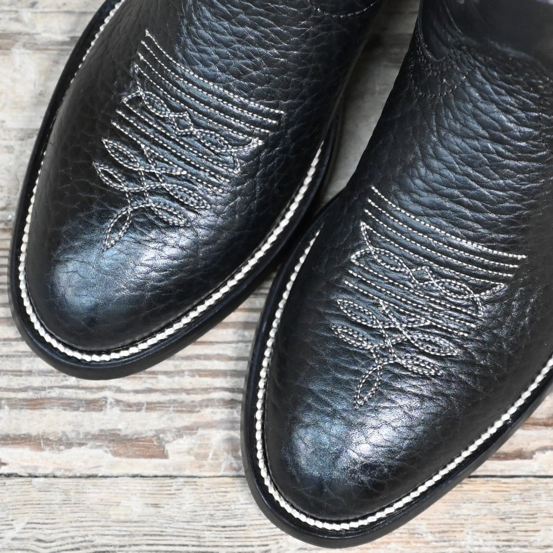 View of Hondo 14" black cowboy boot with bullhide vamp, cowhide top, and medium round toe