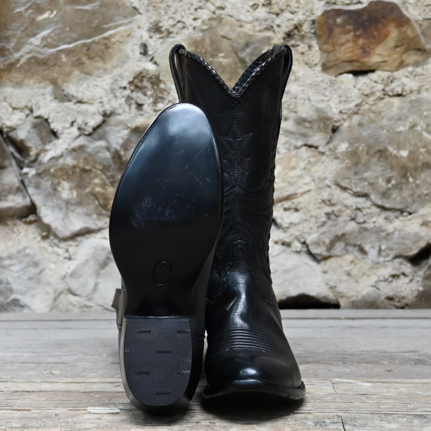 View of Stallion Men’s 13" Western boot with lacing, white buckstitching, and small round toe