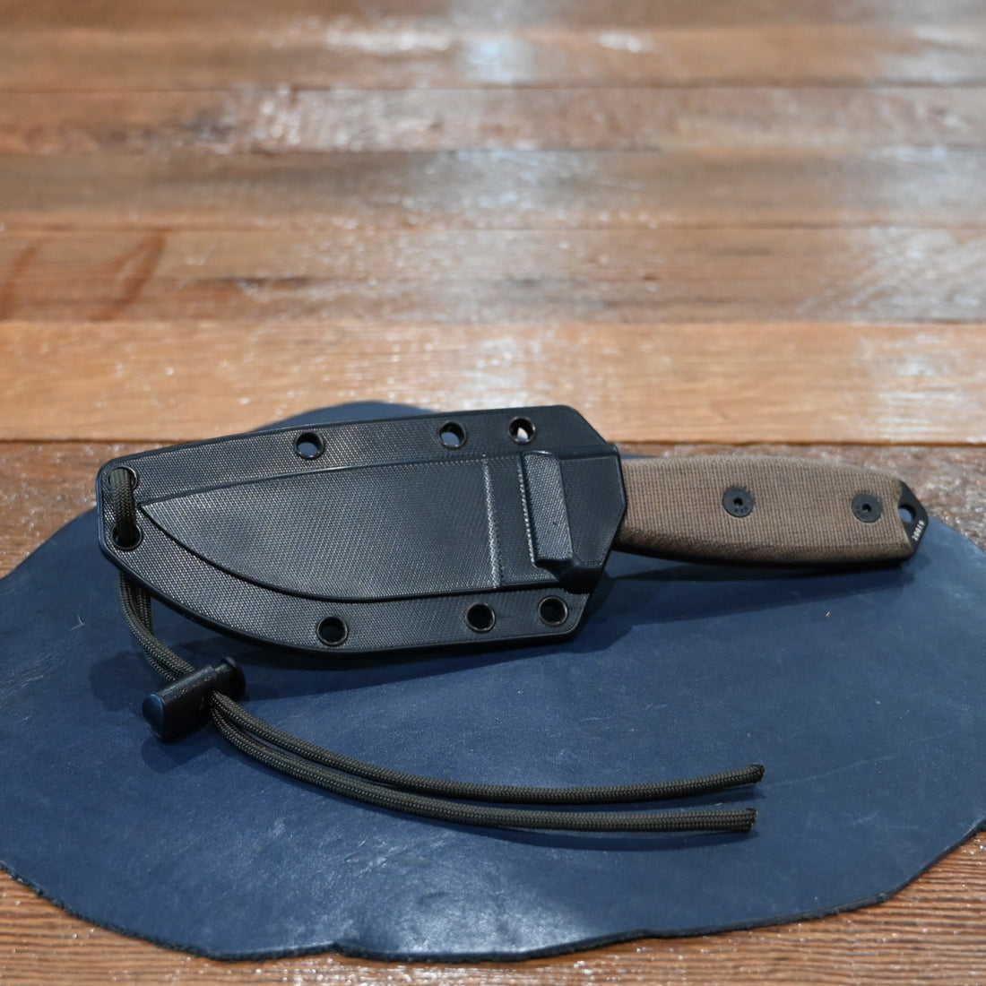 ESEE-3P-CP MIL knife with black blade, micarta handles, glass breaker pommel, and OD MOLLE sheath