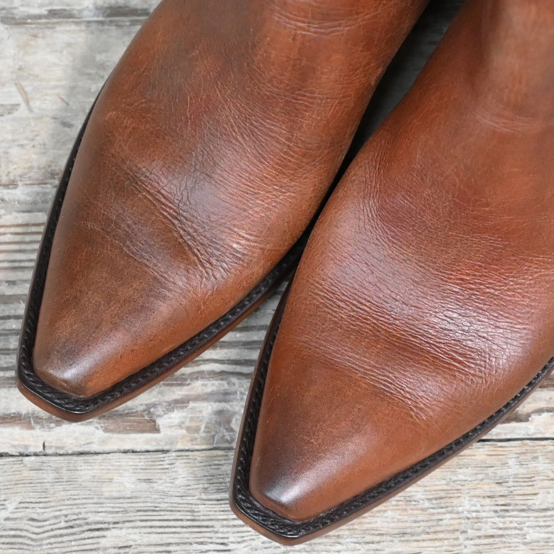 View of Stallion Ladies Zorro zip boot in cognac calf with buckstitching and X 5/8" toe