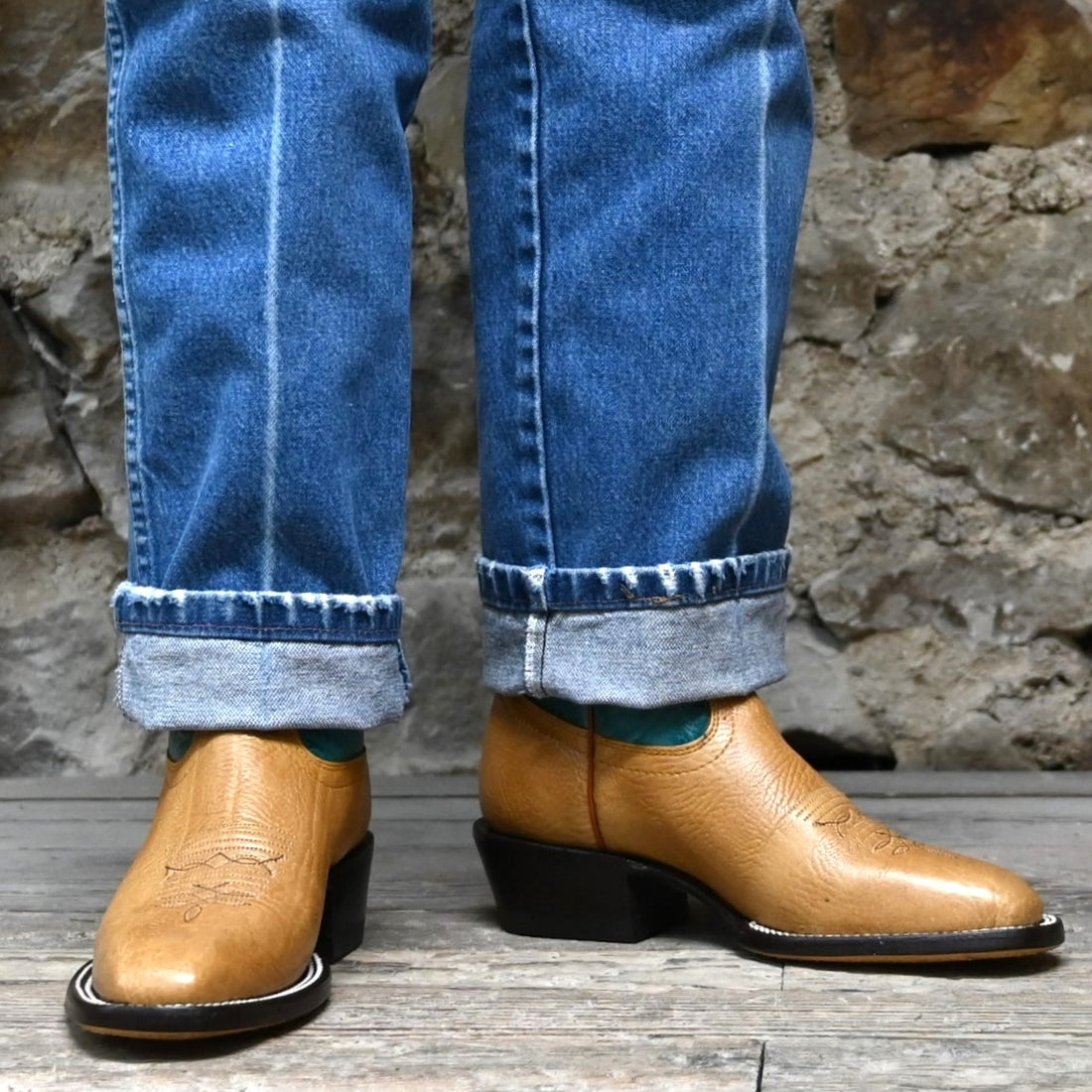 View of Hondo 14" cowboy boot with turquoise volcano top, honey shoulder vamp, and tight square toe