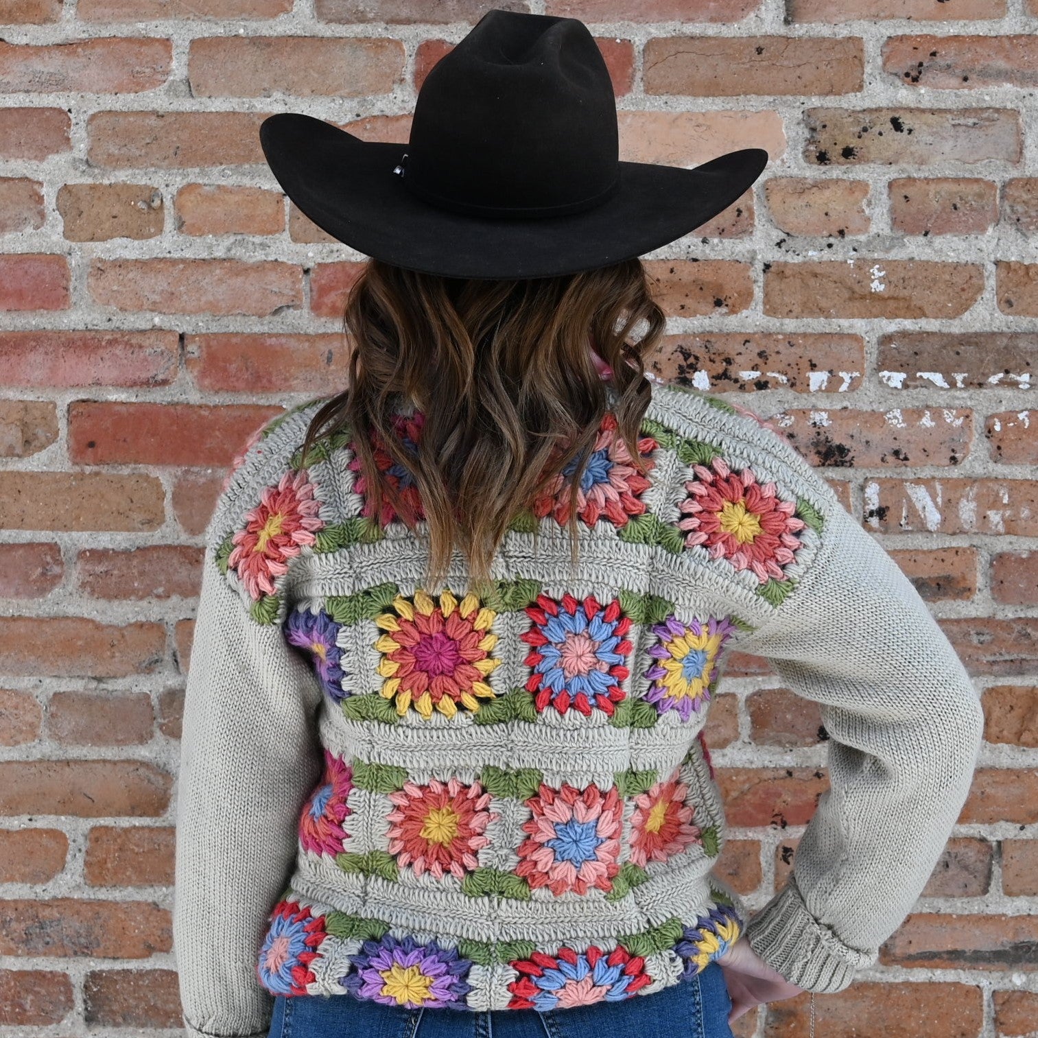 Camelia ladies wool knit taupe cardigan with multicolor 70s floral design and button-up front