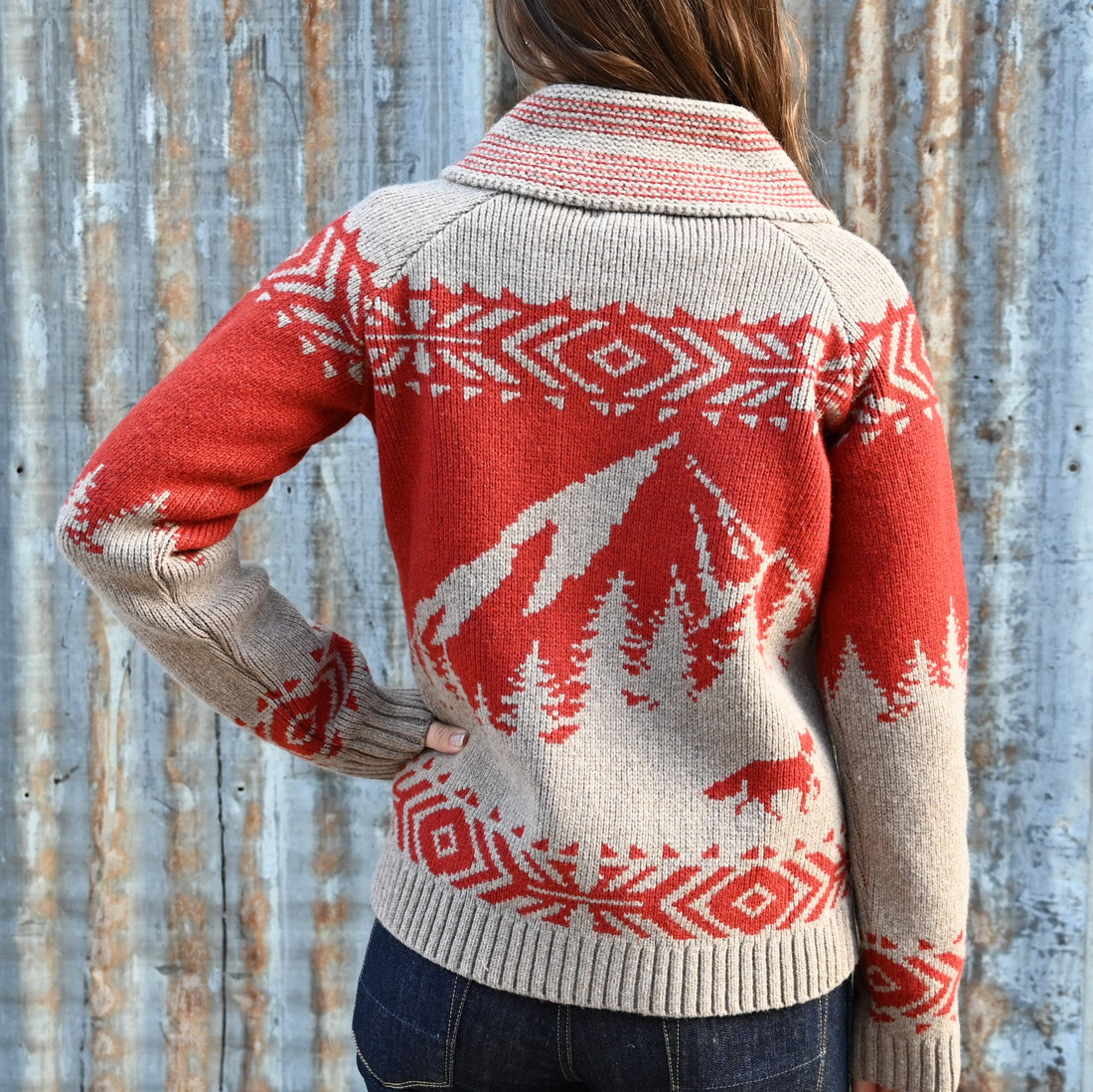 View of Pendleton ladies lambswool cardigan in natural and scarlet with alpine winter motifs