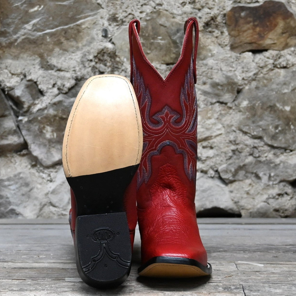 View of Hondo 13" cowboy boot with red cowhide top, red shoulder vamp, and medium square toe