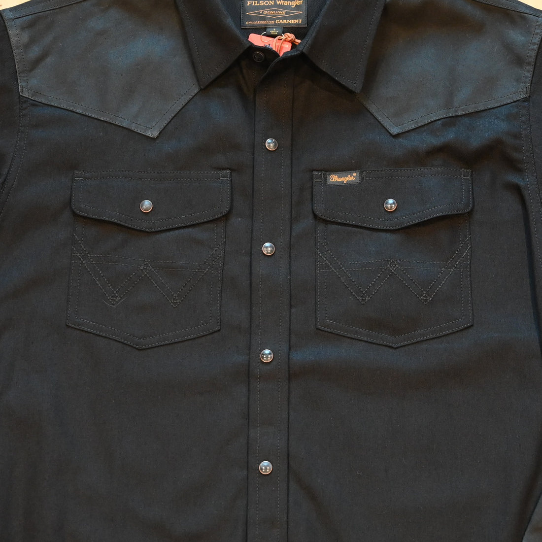 Filson × Wrangler Adventure Shirt in black with canvas overlays and snap pockets