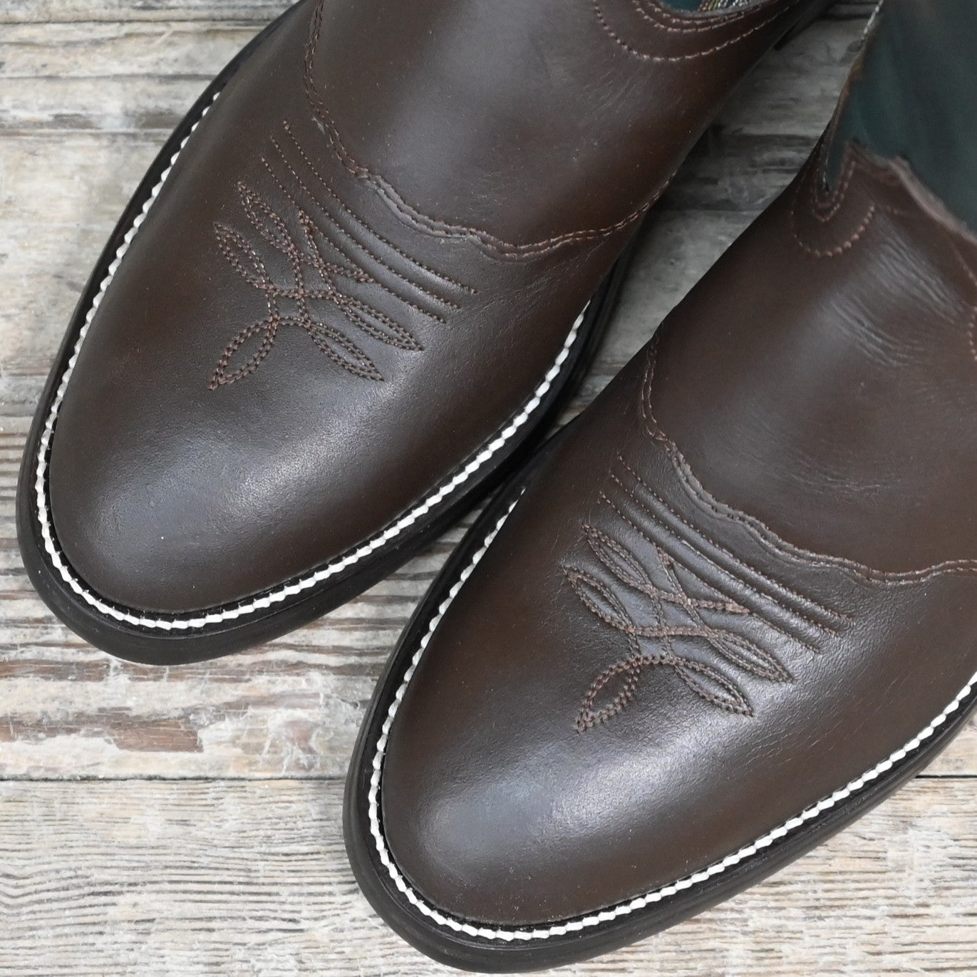 View of Hondo 16" cowboy boot with forest green retan-lined top, brown retan vamp, medium round toe, and spur ledge