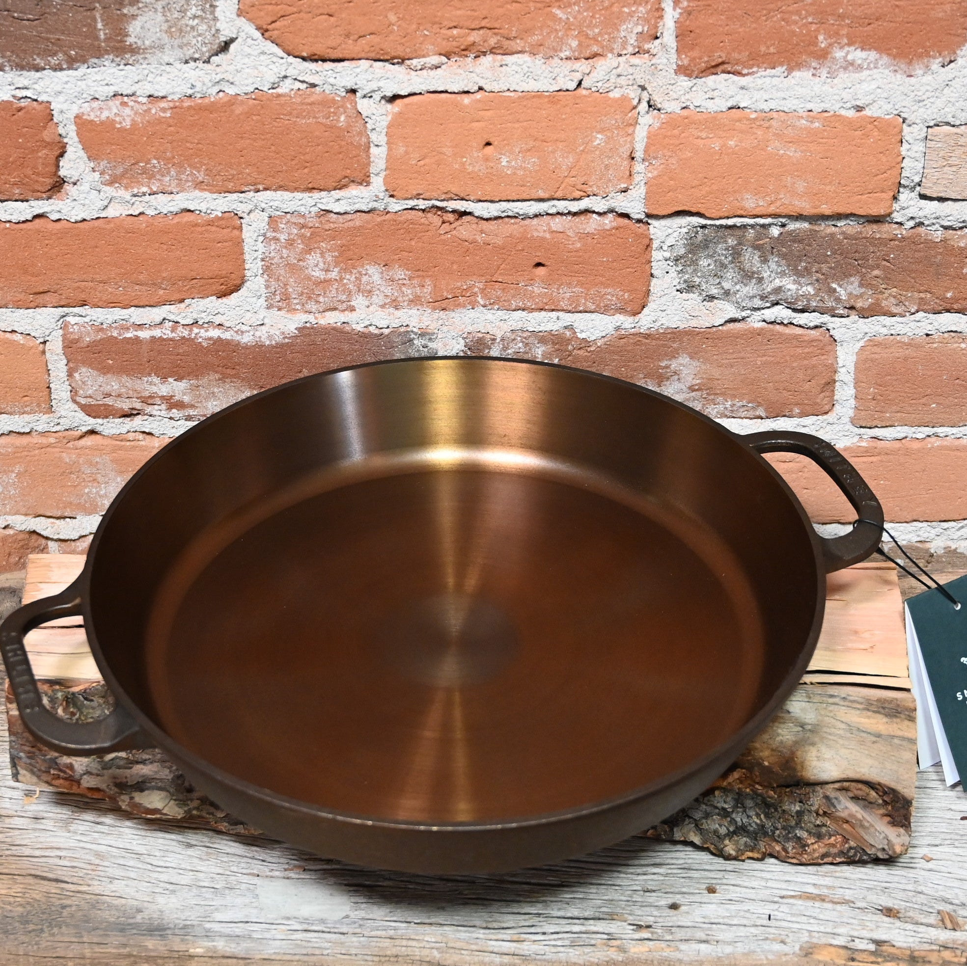 View of Smithey No. 14 Dual Handle Cast Iron Skillet with polished interior and dual ergonomic handles