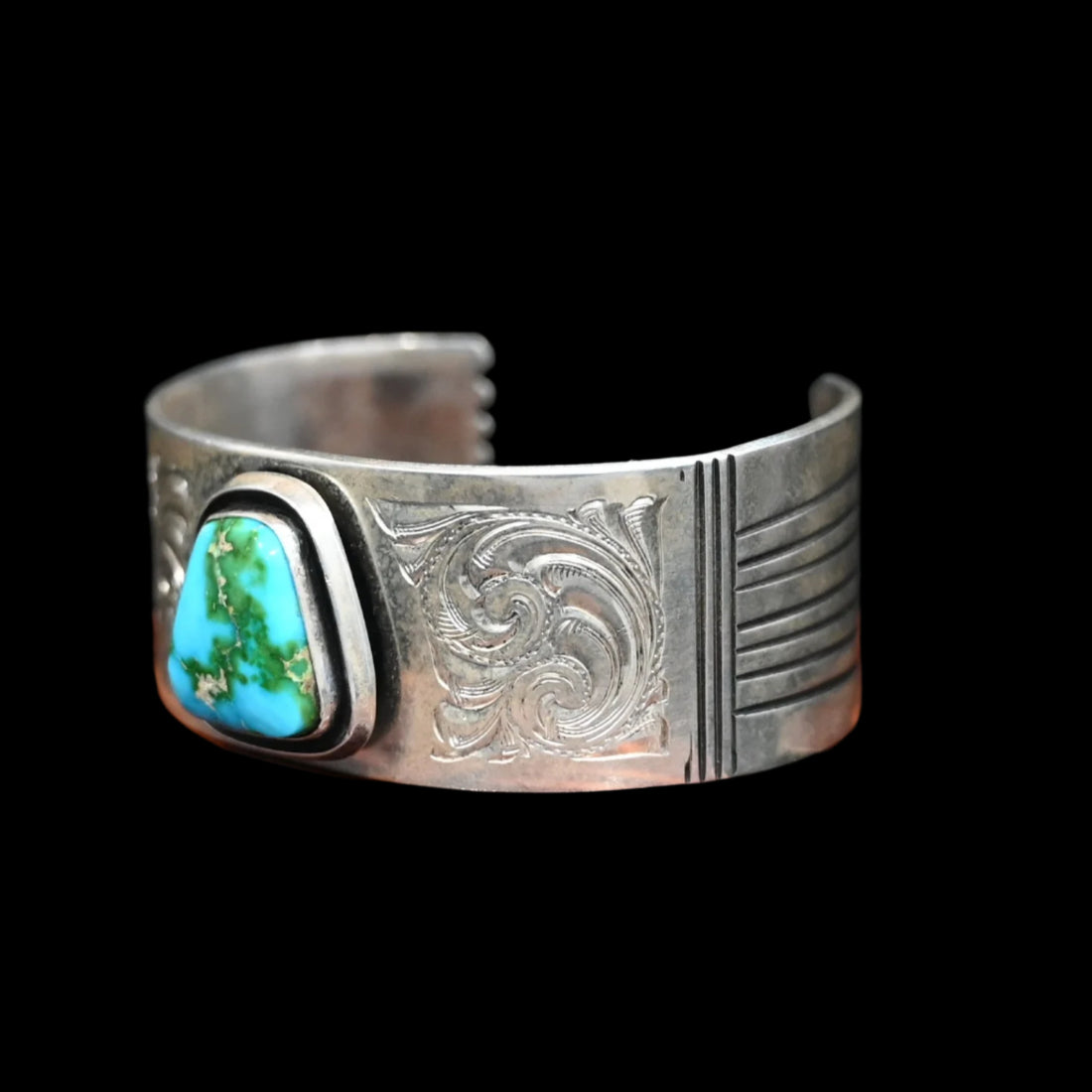 View of Sunwest Silver Leonard Nez Navajo Sonoran Gold Turquoise Cuff featuring Sonoran Gold turquoise with etched patterns in sterling silver